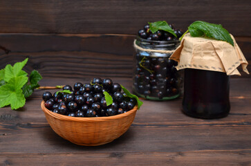 rustic still life with blackcurrants and jam