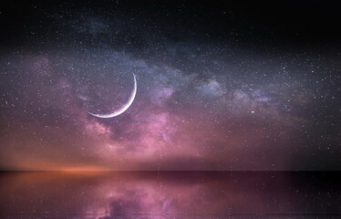 Fototapeta na wymiar moon on lilac blue dark starry sky at night at sea water wave reflection nebula milky way cosmic background 