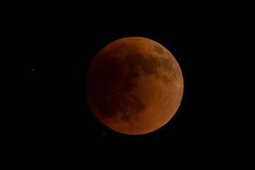 orange moon during a full lunar eclipse