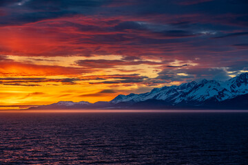 Late evening sunset on panorama of mountains and Mount Fairweather by Glacier Bay National Park in Alaska
