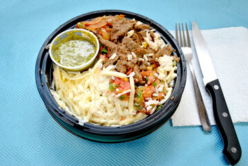 Take-Out Meal of Mexican Fajita Steak Salad with a Spicy Pesto