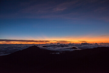Sunrise over the crater of Mount Haleakala, Maui, HI.