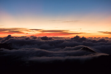 Fototapeta na wymiar Sunrise over the crater of Mount Haleakala, Maui, HI.