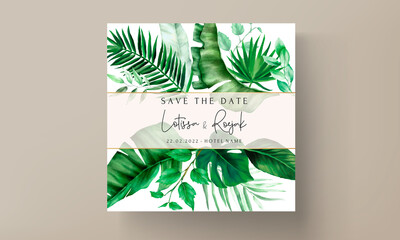 Elegant wedding invitation card with green tropical watercolor