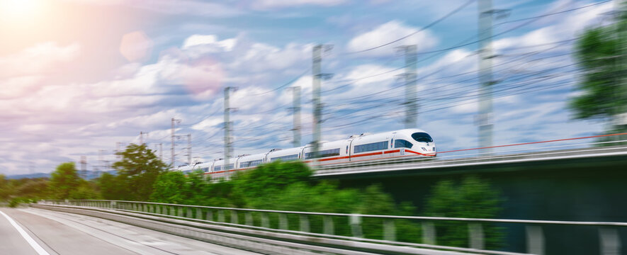 DB Deutsche bahn ICE driving fast on a hight speed railway