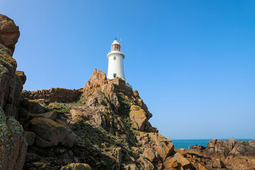 Fototapeta na wymiar Close up view of the La Corbiere lighthouse in Jersey