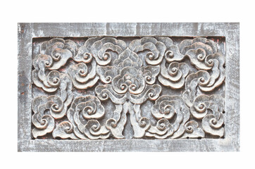  old carved flower pattern on wooden background