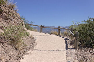 Fototapeta na wymiar Small path in the mountain on a sunny day.