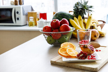 Healthy foods and fruits are on the table in the kitchen