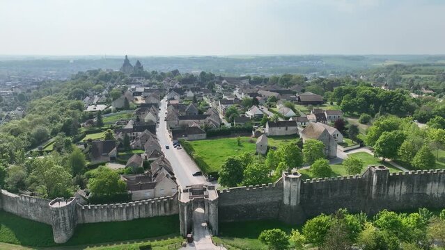 Aerial view of Provins medieval walled town in France surrounded by yellow flowers