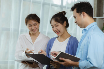 Groups Asian people chatting, business men and women meeting in a conference room, young business man running and running startups, young and energetic group running companies. Startup company concept