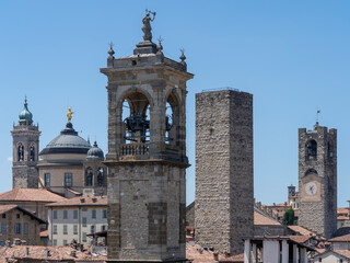 Fototapeta premium Bergamo, Italy. The old town. Landscape at the city center, the old towers and the clock towers from the ancient fortress called La rocca. Bergamo best of Italy and touristic destination