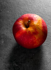 Apples in a dramatic low key concept with a dark background in variety angles for multipurpose