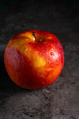 Apples in a dramatic low key concept with a dark background in variety angles for multipurpose