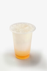 Passionfruit mojito with seeds and ice cubes