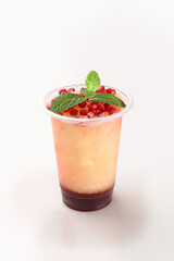 Red bull pomegranate cocktail juice with mint and pomegranate slices