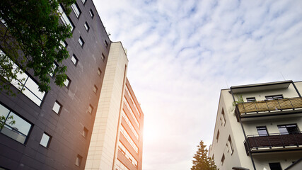 Glass and aluminum facade of a modern office building. View of futuristic architecture. Office building with cloud reflection on windows