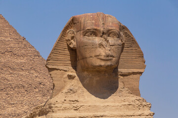 Great Sphinx in front of pyramid of Khafre in Giza