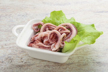 Marinated squid tentacles in the bowl