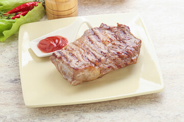 Grilled rib-eye steak beef meat