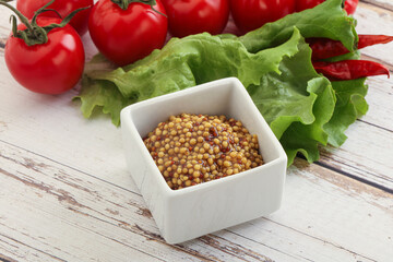 Mustard seeds sauce in the bowl