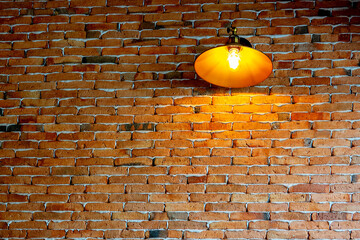 Interior of red brick wall with vintage pendant lamps