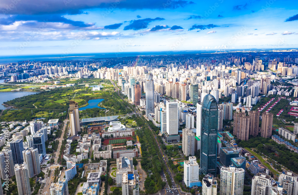 Wall mural landmark urban landscape of haikou city near the evergreen central park business district, hainan pr