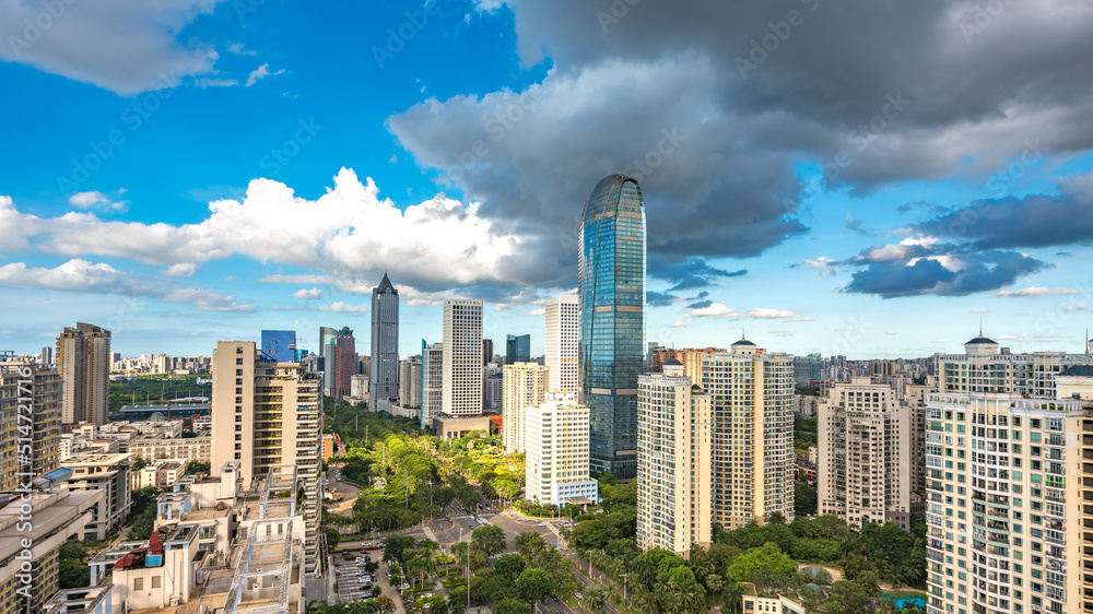 Wall mural landmark urban landscape of haikou city near the evergreen central park business district, hainan pr