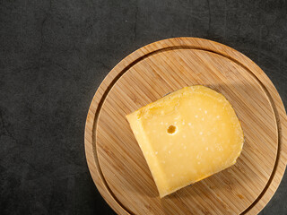 cheese on a wooden board