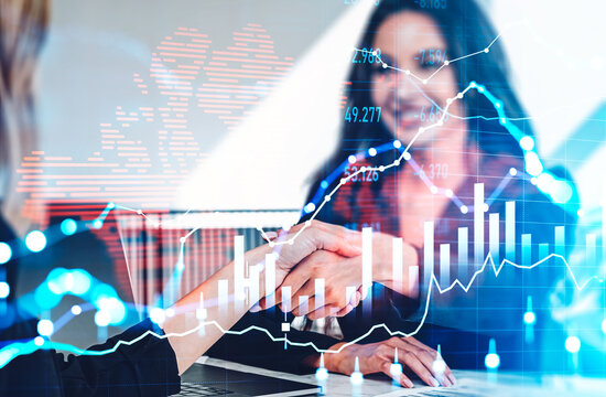 Business people handshake, stock market chart with candlesticks