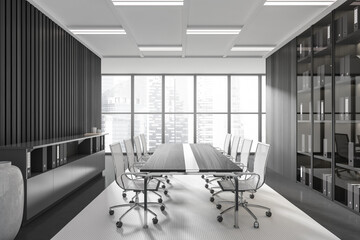Grey meeting room interior with chairs and table, shelf and panoramic window