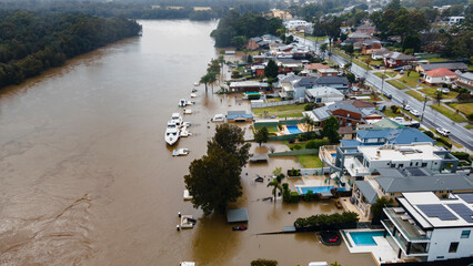 Aerial drone view of major flooding along Georges River at East Hills in South West Sydney, NSW, Australia during severe weather in July 2022 - obrazy, fototapety, plakaty