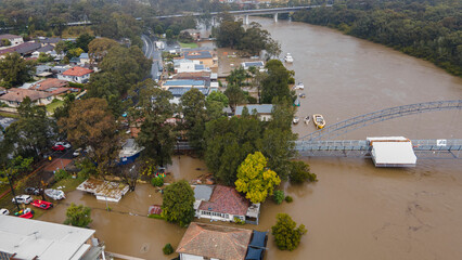 Aerial drone view of major flooding along Georges River at East Hills in South West Sydney, NSW, Australia during severe weather in July 2022 - obrazy, fototapety, plakaty
