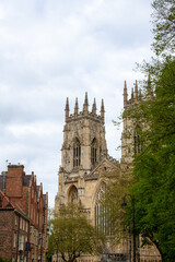 Fototapeta premium Close up exterior front view of The Cathedral and Metropolitical Church of Saint Peter, more commonly known as York Minster, in the city of York, England