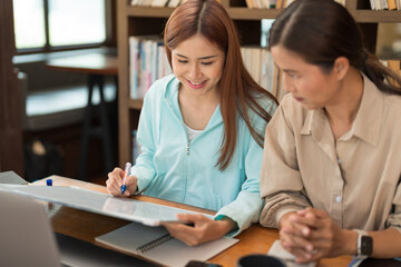 Fototapeta premium College education concept, Teenage girl taking quiz of tutor on whiteboard while study tutorial