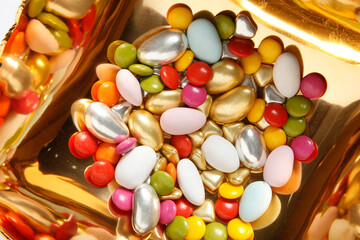 colorful candies in sugar bowl