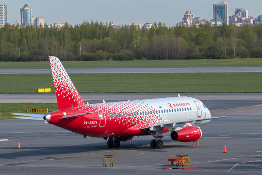 SAINT PETERSBURG, RUSSIA - MAY 20, 2022: Sukhoi SuperJet 100-95B "Maikop" (RA-89174) of Rossiya - Russian Airlines on the airfield of Pulkovo airport on a sunny May day