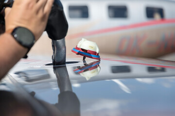 Fuel nozzle filling up aircraft