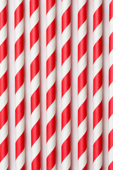 Full frame photo of red and white straws