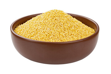 Dry millet groats in ceramic bowl, isolated on white background. Full depth of field.