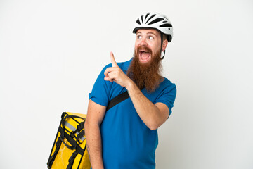 Young reddish caucasian man with thermal backpack isolate don white background intending to realizes the solution while lifting a finger up