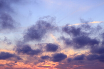 stunning evening sky, blue rainy clouds and sunlight