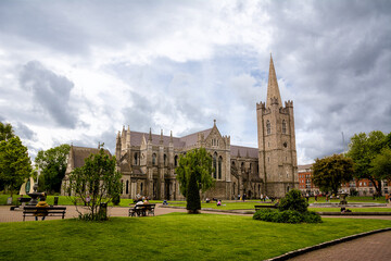 Fototapeta premium St. Patrick's Cathedral, with the tower and gardens in the centre of Dublin, Ireland.