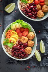 Energetic Mexican salad with vegetables, meatballs and buckwheat groats.