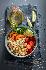 Diet salad with chickpeas, vegetables and buckwheat groats.
