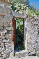 Old, picturesque main front door in mediterranean region house