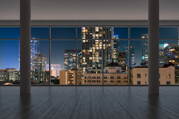 Downtown Los Angeles City Skyline Buildings from High Rise Window. Beautiful Expensive Real Estate overlooking. Epmty room Interior Skyscrapers View Cityscape. Night. 3d rendering.