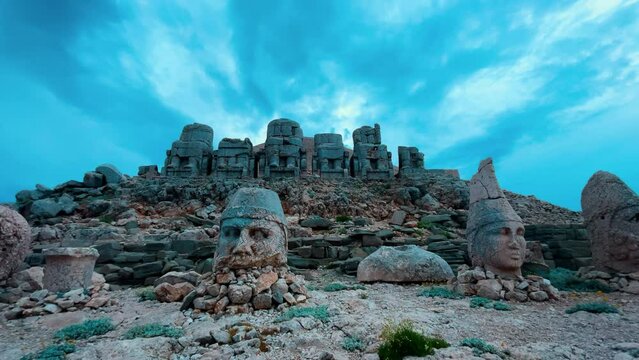 Stone big heads and throne on the Nemrud Mountain in Turkey. 4K Timelapse