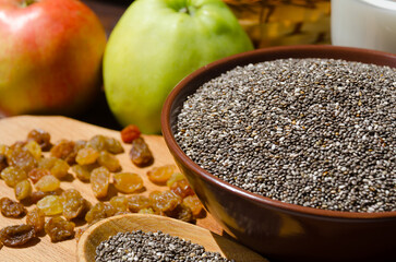 Chia in a bowl, raisins and yogurt.