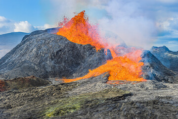 active volcano on the Reykjanes Peninsula. strong lava flow from a volcanic crater in Iceland....